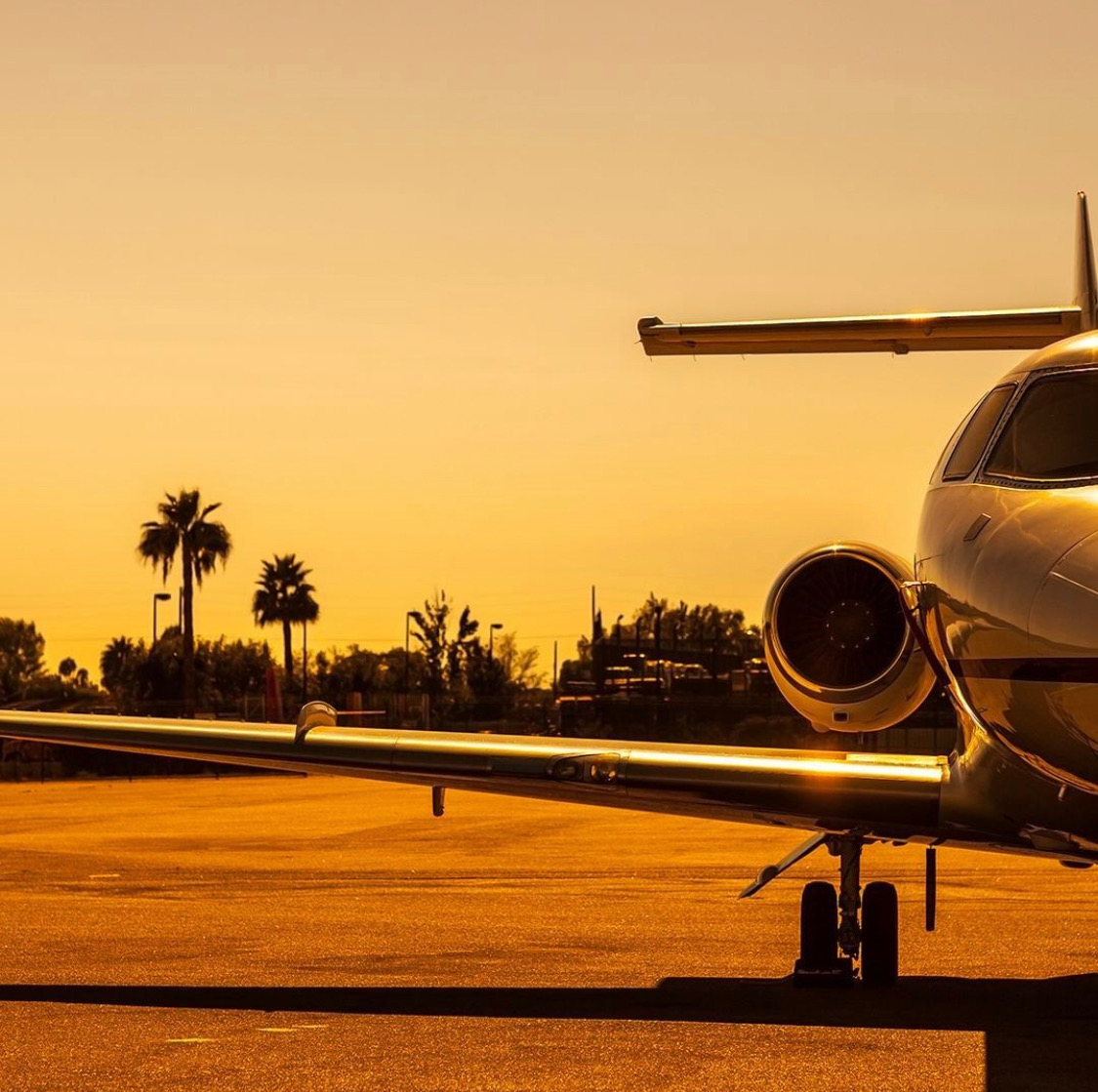 Private jet at golden sunset — Island Queens Caribbean inflight catering